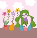 Happy garden, girl with green hairstyle floral planting plants in pot flowers fruit Royalty Free Stock Photo