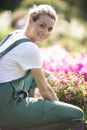 happy gardener woman smiling at camera Royalty Free Stock Photo