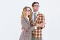 Happy geeky hipster couple holding their hands