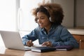 Happy gen Z Black student girl chatting online with teacher Royalty Free Stock Photo