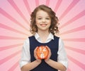 Happy girl with alarm clock over pink background Royalty Free Stock Photo