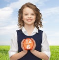 Happy girl with alarm clock over summer background Royalty Free Stock Photo