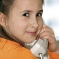 Happy girl with analog phone