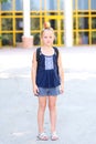 Little Girl Standing With Apple On Her Head. Royalty Free Stock Photo