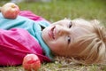 Happy girl with apples