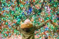 Happy girl on the background of the Rockefeller Christmas tree in New York