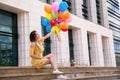 Happy girl with ballons in hands Royalty Free Stock Photo