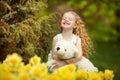 Happy girl in the blooming garden Royalty Free Stock Photo