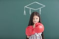 girl with boxing gloves and graduation concept Royalty Free Stock Photo