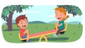 Happy girl and boy kids swinging on seesaw Royalty Free Stock Photo