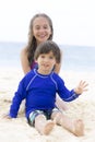 Happy Girl and Boy Playing at the beach Royalty Free Stock Photo
