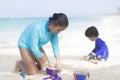 Happy Girl and Boy Playing at the beach Royalty Free Stock Photo