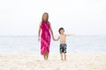 Happy Girl and Boy Playing at the beach Royalty Free Stock Photo