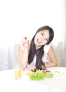 A happy girl and breakfirst Royalty Free Stock Photo