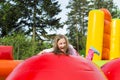 Happy Girl Child on Inflate Castle Royalty Free Stock Photo