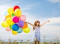 Happy girl with colorful balloons Royalty Free Stock Photo
