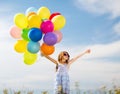 Happy girl with colorful balloons Royalty Free Stock Photo