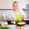 Happy girl with cooked omelet Royalty Free Stock Photo