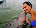 Happy Girl And Cute Dolphin Royalty Free Stock Photo