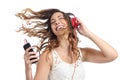 Happy girl dancing and listening to the music Royalty Free Stock Photo