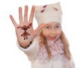 Happy girl demonstrating Christmas symbol painted on her hand. reindeer