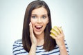 Happy girl with dental braces holding green apple. Royalty Free Stock Photo