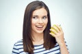 Happy girl with dental braces holding green apple. Royalty Free Stock Photo