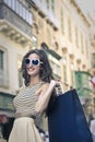 Happy girl doing shopping Royalty Free Stock Photo