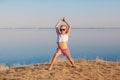 A happy girl doing yoga outdoors Royalty Free Stock Photo