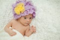 Happy girl with Down syndrome bakes cookies Royalty Free Stock Photo