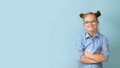 Happy girl with Down syndrome having fun and laughing in the studio. Banner