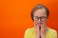 Happy girl with Down syndrome having fun and laughing in the studio