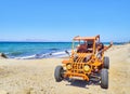 A happy girl driving a Buggy on a beach dune. Kos island. South Royalty Free Stock Photo