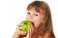 Happy girl eating green apple