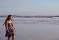 Happy girl enjoying time on beautiful beach. Royalty Free Stock Photo