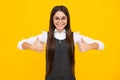 Happy girl face, positive and smiling emotions. Like it. Portrait of joyful teenage child girl showing thumbs up and Royalty Free Stock Photo