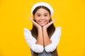 Happy girl face, positive and smiling emotions. Portrait of beautiful happy smiling teenage girl on yellow studio Royalty Free Stock Photo