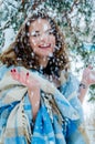 Happy girl and falling snowflakes