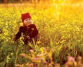 Happy girl with field flowers