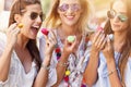 Happy girl friends hanging out in the city in summer Royalty Free Stock Photo