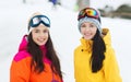 Happy girl friends in ski goggles outdoors Royalty Free Stock Photo