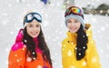 Happy girl friends in ski goggles outdoors Royalty Free Stock Photo