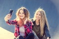 Happy girl friends taking a selfie on a summer day Royalty Free Stock Photo