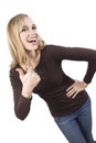 A happy girl gives a big thumbs up Royalty Free Stock Photo