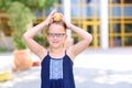 Little Girl Smiling With Apple On Her Head. Royalty Free Stock Photo