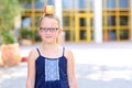 Little Girl Smiling With Apple On Her Head. Royalty Free Stock Photo