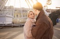 Happy girl and guy are resting on square Royalty Free Stock Photo