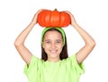 Happy girl in Halloween with a big pumpkin Royalty Free Stock Photo