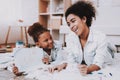 Child and Mother Happy Time Together. Milatto and Girl. Royalty Free Stock Photo