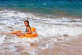 Happy girl have fun in sea surf on beach Royalty Free Stock Photo